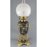 Mark V. Marshall for Doulton Lambeth- a stoneware oil lamp c. 1882, relief decorated with stylised