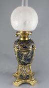 Mark V. Marshall for Doulton Lambeth- a stoneware oil lamp c. 1882, relief decorated with stylised