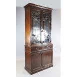 A George III mahogany secretaire bookcase, with two astragal glazed doors over fall front, drawer