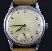 A gentleman's mid 1940's stainless steel Omega manual wind wrist watch, with Arabic dial and