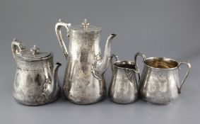 A Victorian silver four piece tea and coffee service by Robert Hutton, of tapering cylindrical