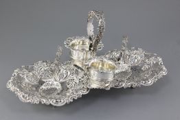 A late Victorian pierced silver strawberry stand by Mappin Bros, comprising a single handled stand