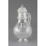 A French cut crystal claret jug and cover, late 19th century, probably Baccarat, the pear shaped