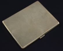 A late 1920's engine turned 9ct gold cigarette case, of rectangular form, with interior engraved