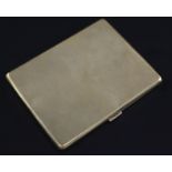 A late 1920's engine turned 9ct gold cigarette case, of rectangular form, with interior engraved