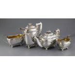 A George V four piece silver tea set by John, Hunt, of rounded rectangular form, with "basket weave"