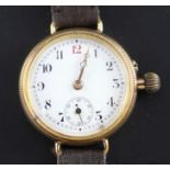 An early 20th century 9ct gold Borgel cased manual wind wrist watch, on later associated leather