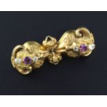 A Victorian gold and gem set bar brooch, with rope twist decoration, 1.75in.