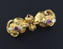 A Victorian gold and gem set bar brooch, with rope twist decoration, 1.75in.