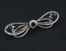 A 19th century gold and silver, diamond and sapphire trembleuse bow brooch, set with three round cut