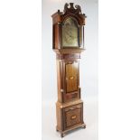 An early 19th century mahogany banded oak eight day longcase clock, the arched brass dial with