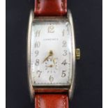 A gentleman's stylish 1930's gold plated Longines manual wind wrist watch, with rectangular Arabic