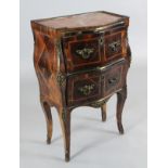 A 19th century French kingwood and rosewood bombé commode, with rouge marble top and two drawers,