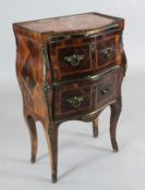 A 19th century French kingwood and rosewood bombé commode, with rouge marble top and two drawers,