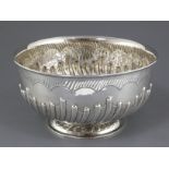 A late Victorian demi fluted silver punch bowl by Goldsmiths & Silversmiths Co, London, 1891, 9.
