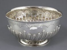 A late Victorian demi fluted silver punch bowl by Goldsmiths & Silversmiths Co, London, 1891, 9.