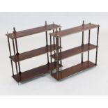 A pair of Regency style brass strung mahogany three tier wall shelves, W.2ft H.1ft 11in. D.6.5in.