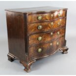 A George III mahogany serpentine chest, of four graduated long drawers, on ogee feet, W.3ft 6in. D.