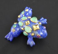 A Seaman Schepps 18ct gold mounted gem set lapis lazuli frog brooch, 1.75in.