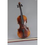 A Sebastian Kloz of Mittenwald violin, cased with two bows, 23in.