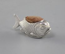 An Edwardian novelty silver pin cushion modelled as a fish by Sampson Mordan & Co, Chester, 1908,