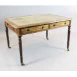 A George IV mahogany library table, with pale green skiver and four frieze drawers, on turned legs