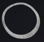 A 1980's textured 9ct white gold fringe necklace, 16.75in.