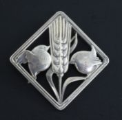 An early 1960's Georg Jensen sterling silver dove and wheatsheaf brooch, no. 250, 1.5in.