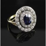 A 1940's gold, synthetic? sapphire and diamond cluster ring, of oval form, the central oval cut