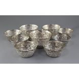 A set of twelve late 19th/early 20th century Chinese Export silver pierced bowls by Hung Chong & Co,