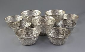 A set of twelve late 19th/early 20th century Chinese Export silver pierced bowls by Hung Chong & Co,