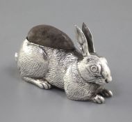 An Edwardian novelty silver pin cushion modelled as a rabbit by Adie & Lovekin, Birmingham, 1907,