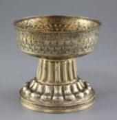 An Edwardian embossed silver gilt replica of the 16th century Tudor Holms Cup, of font shape, with