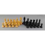 A Jaques & Son Staunton pattern ebony and boxwood library chess set, in original wooden case, with