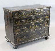 An early 18th century black Japanned and gilt decorated chest of drawers, decorated with Chinese