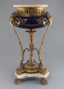 A Louis XV style ormolu, pink marble and blue ceramic brûle-parfum, with ribbon tie and acanthus