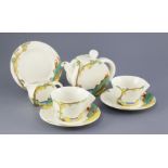 A Clarice Cliff Bizarre Bonjour 'Secrets' pattern seven-piece part tea service, black printed