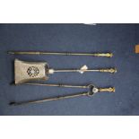 A set of three George III steel and bronze mask handled fire irons