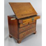 A George III mahogany architect's chest. with rising top, two short and two long drawers, on bracket