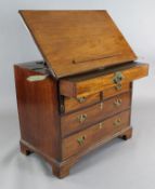 A George III mahogany architect's chest. with rising top, two short and two long drawers, on bracket