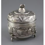 A late 19th century Indian silver circular box and cover by C. Krishniah Chetty, Bangalore, embossed