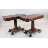 A pair of early Victorian mahogany tea tables, with folding D shaped tops, on turned stems and