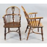 A set of three 19th century yew wood and elm Windsor chairs, with crinoline stretchers, and