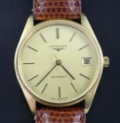 A gentleman's 18ct gold Longines automatic wrist watch, with baton numerals and date aperture, on