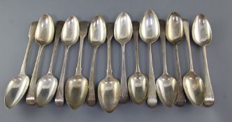 Fourteen assorted George III silver table spoons, various patterns, dates and makers, 30 oz.