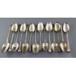 Fourteen assorted George III silver table spoons, various patterns, dates and makers, 30 oz.