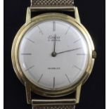 A gentleman's 1960's 18ct gold Eska Incabloc manual wind wrist watch on a 9ct gold mesh bracelet,