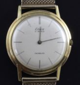 A gentleman's 1960's 18ct gold Eska Incabloc manual wind wrist watch on a 9ct gold mesh bracelet,