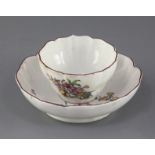 A Chelsea petal lobed tea bowl and saucer, c.1755, each painted with insects and floral sprays,