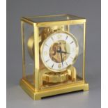 A Jaegar Le Coultre lacquered brass Atmos clock, number 450671, 8.75in.